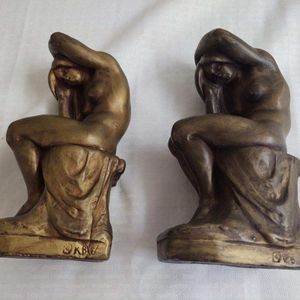 Vintage KBW nude seated figural bookends; bronze clad art.